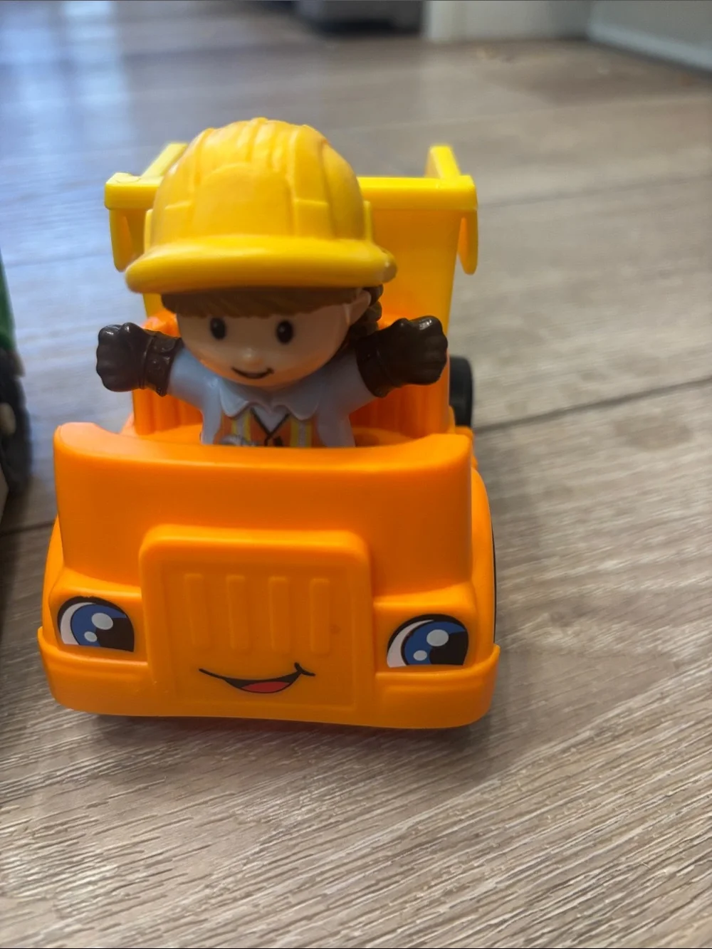 4 Fisher Price Little People vehicles and people